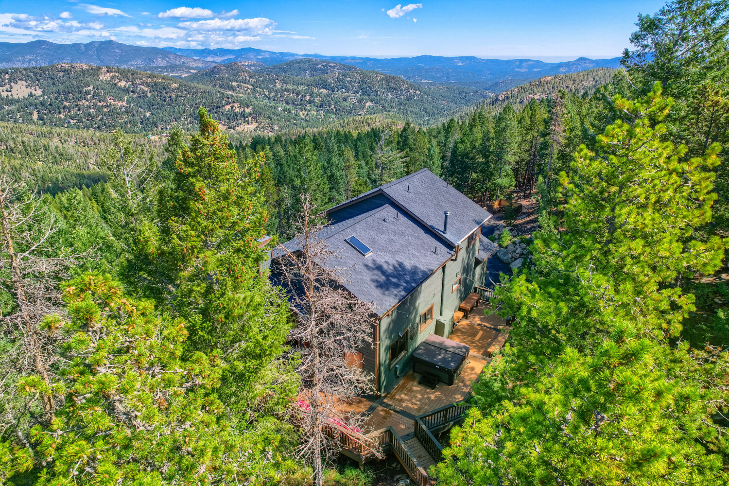 Spacious multi-level wooden deck and hot tub
