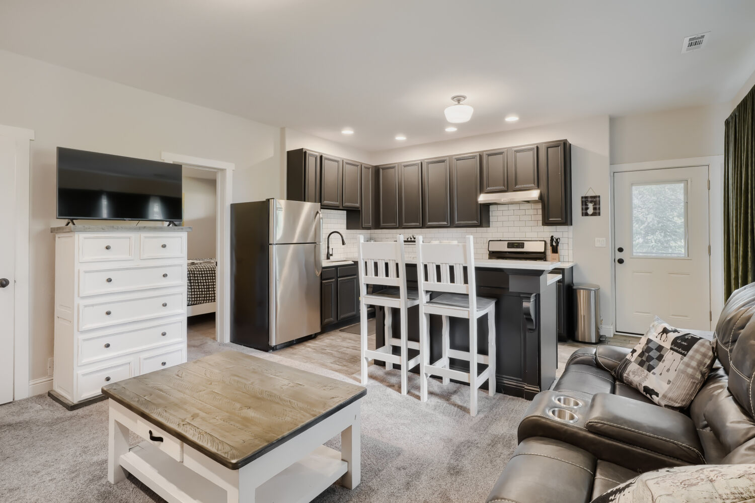 Lower-level apartment with wet bar