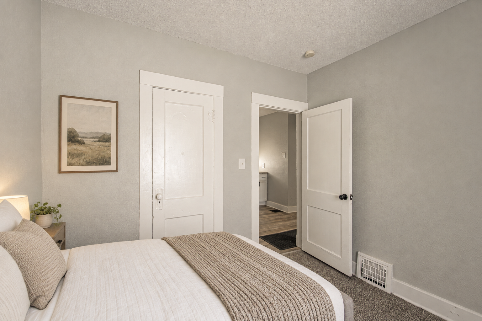 Second bedroom with artwork